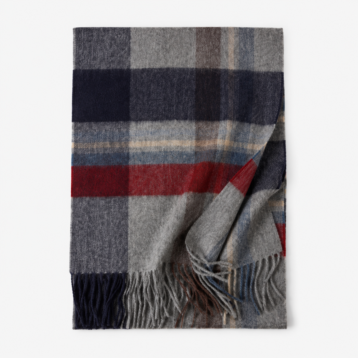 Detail of the grey and blue check weave on a cashmere blanket scarf