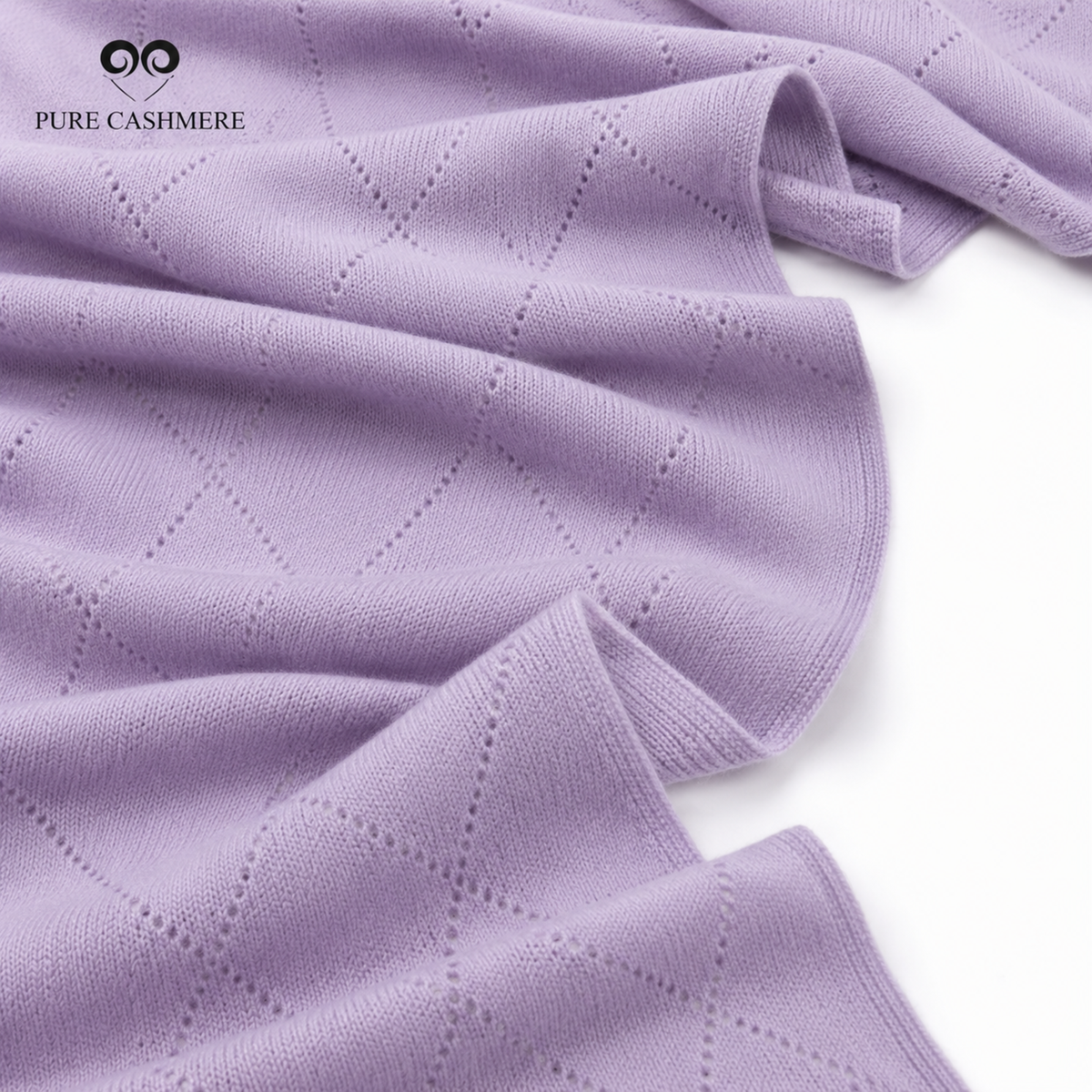 Close-up of lavender cashmere knit fabric showing the weave and drape