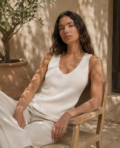 Grey ribbed cashmere vest shown from the side on model