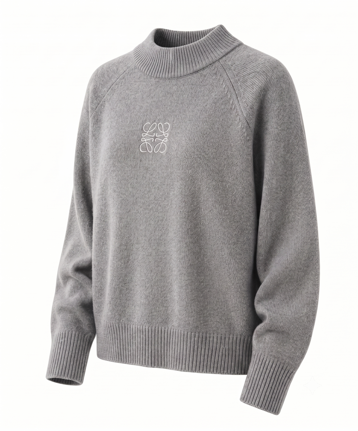 Close-up of the folded half-turtleneck collar on a grey cashmere jumper