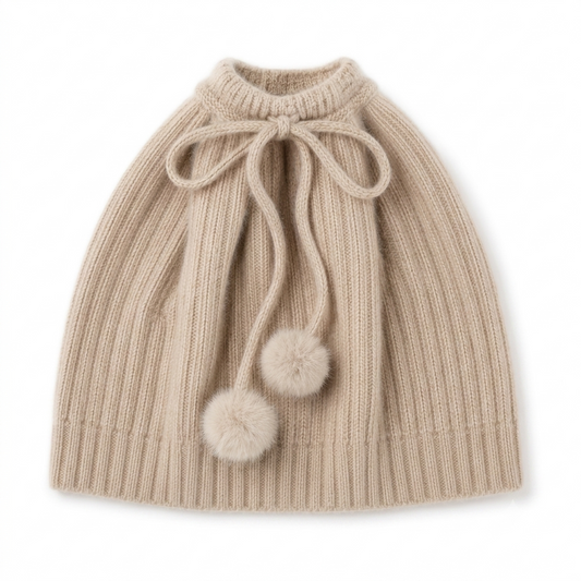 Beige knitted cashmere monkey cap with pom-pom ties