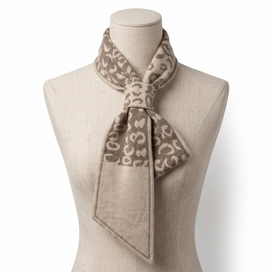Small beige cashmere neck scarf tied in a knot, bandana style