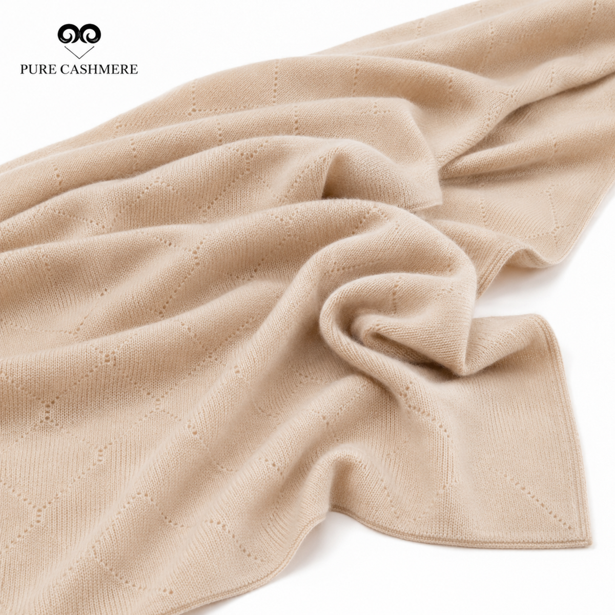 Close-up of beige and taupe cashmere knit fabric showing the weave