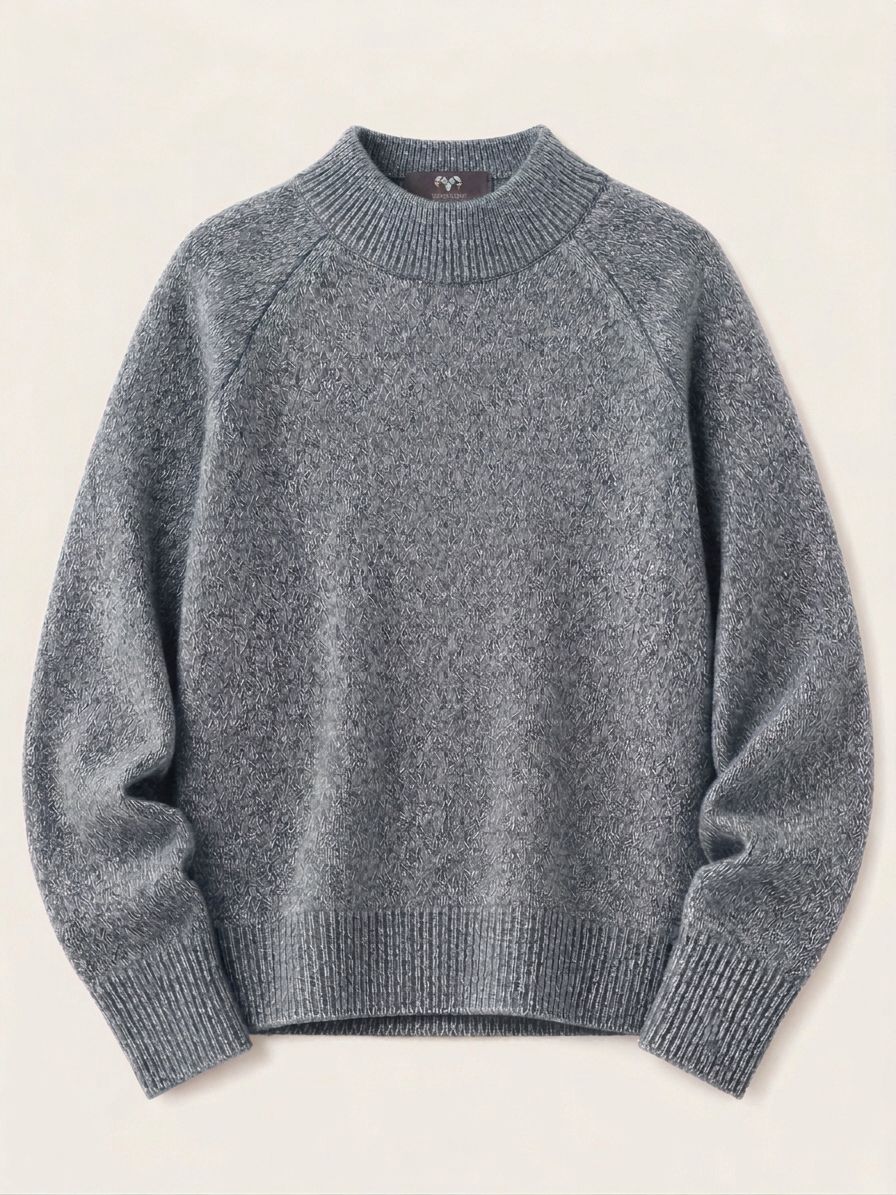 Detail of the cuff and knit texture on a blue and white cashmere jumper
