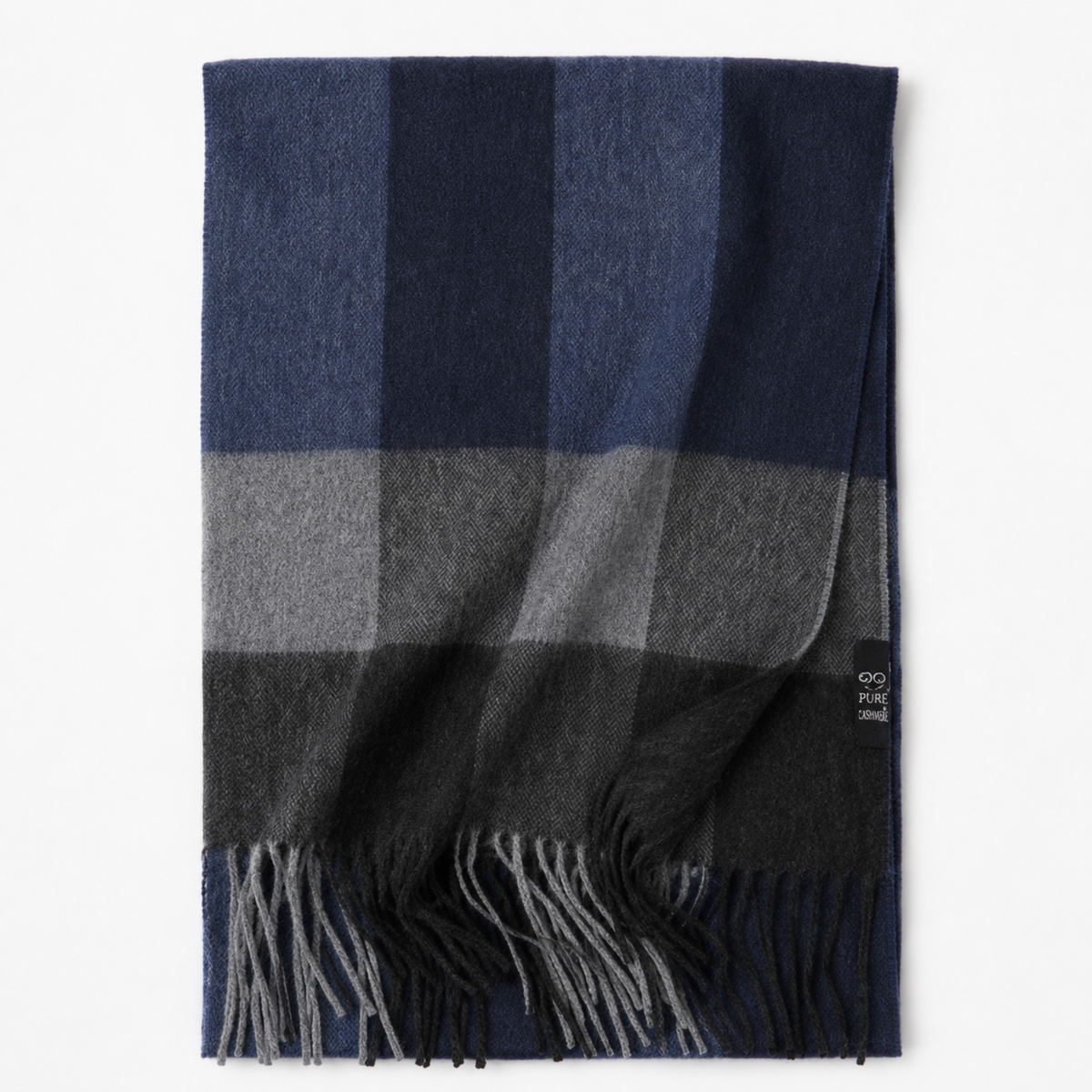 Navy and grey tartan cashmere blanket scarf draped over the shoulders